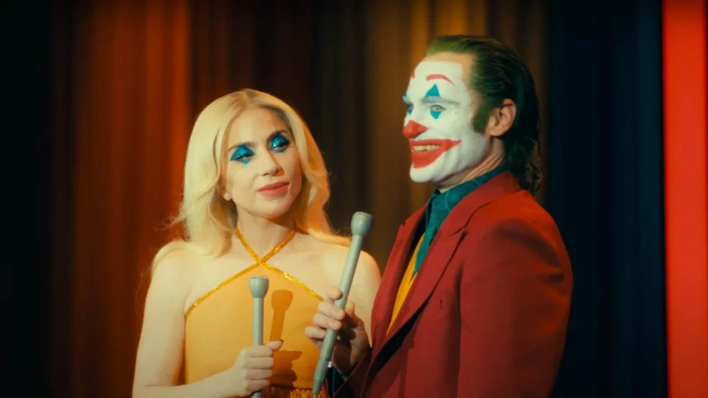 Joaquin Phoenix retorna como Coringa, ao lado de Lady Gaga como Arlequina, em uma sequência ambientada no Asilo Arkham,