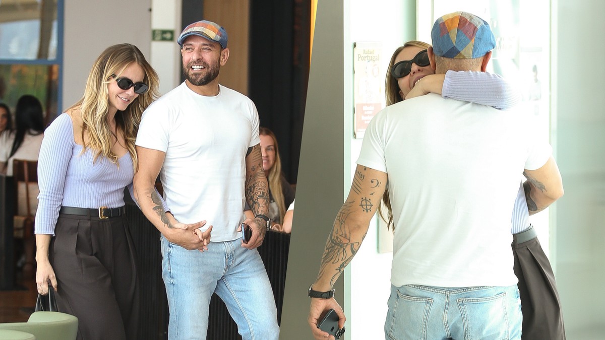 De mãos dadas, Paolla Oliveira e Diogo Nogueira passeiam em shopping