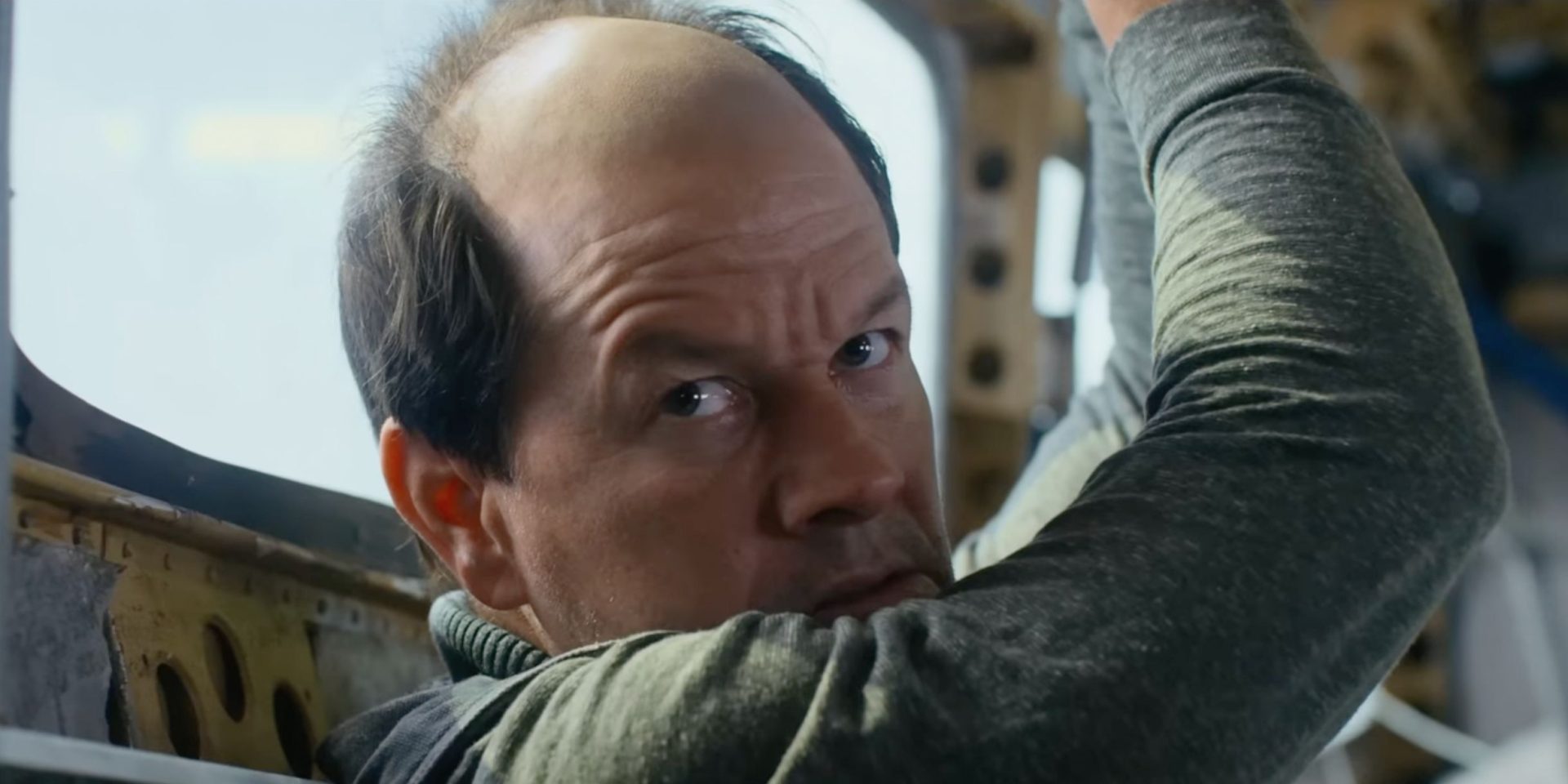 Mark Wahlberg Is a Balding, Unhinged Hitman in Mel Gibson's Flight Risk Trailer